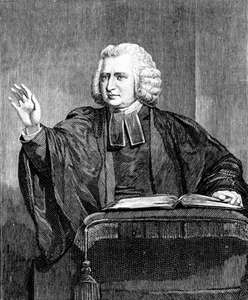 John Wesley preaching with gown and tabs